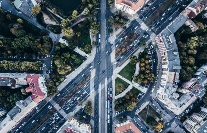Aerial drone shot urban city busy road intersection